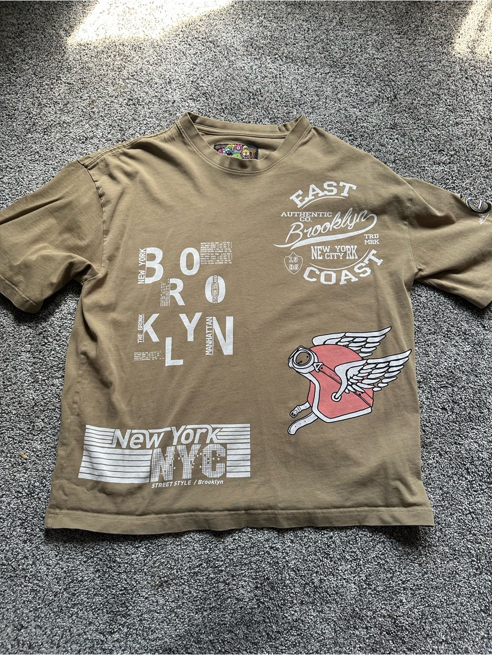 Brooklyn Graphic Tee in tan with Pink Winged Patch